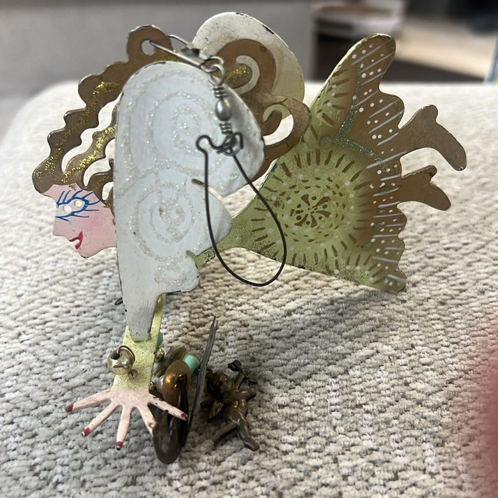 Unique Metal Art Figurine with Intricate Design Karen. Rossi